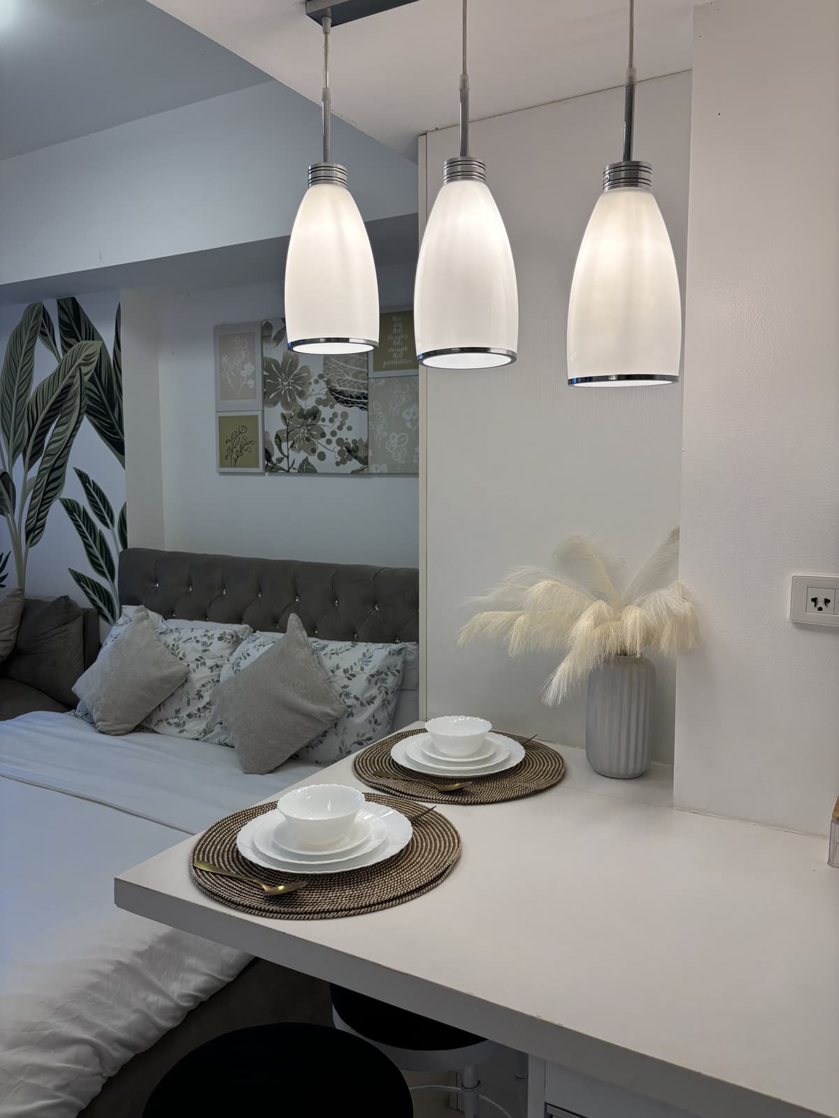 Pendant-lit dining counter set for two
